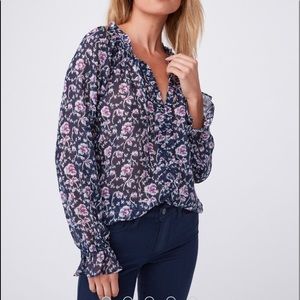 Paige blouse with silver accents. Never worn.